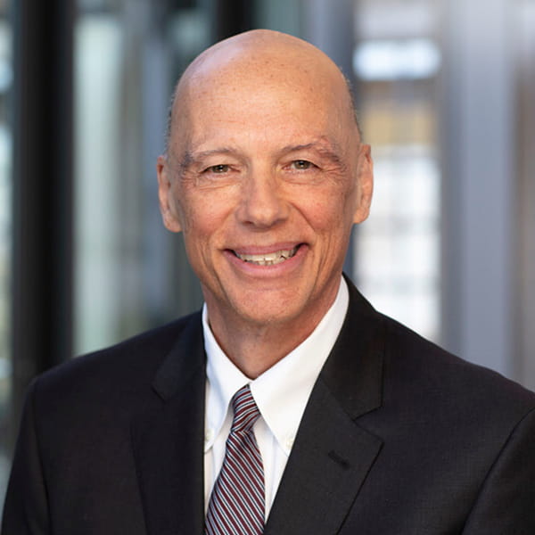 Headshot of John Ryan